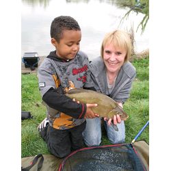 Karen bags a lovely 6lb Tench and we are all smiles!