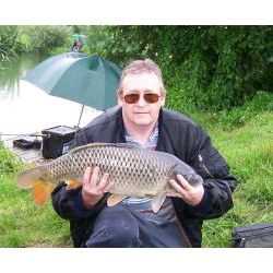 Graham Smith with his PB 15lb Common taken from the Pleasure Lake