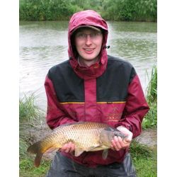 Mavers Pairs Qualifier - S Colclough takes a nice carp despite the rain that was a feature of the event